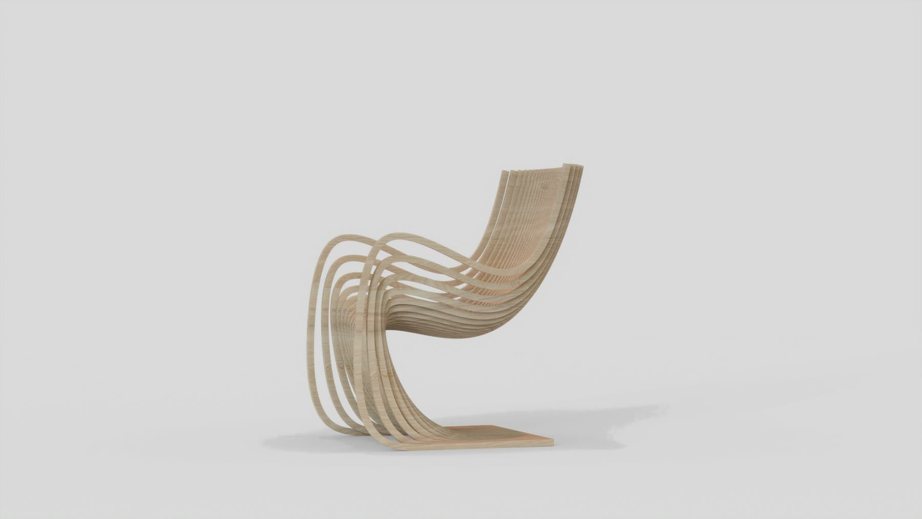 Sculptural bentwood lounge chair against a pale backdrop