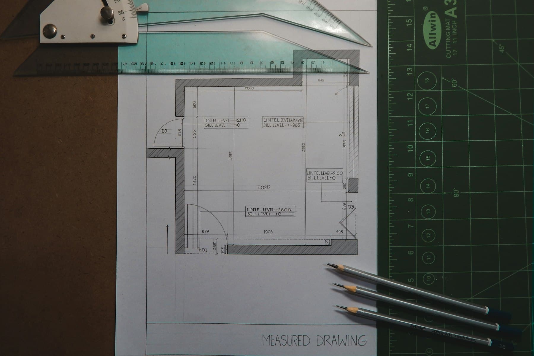 Floor plan drawn on a drafting board