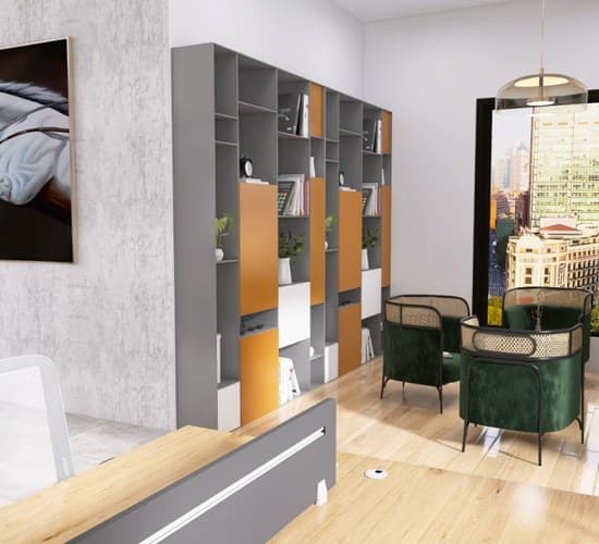 Cabin with grey and orange shelving and green lounge chairs