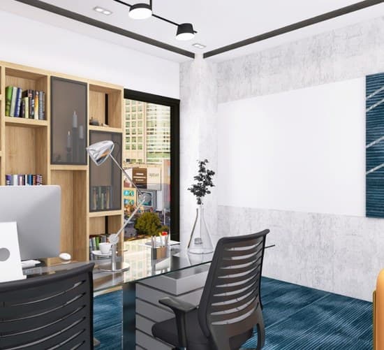 Cabin with timber bookshelves, glass desk and blue carpet
