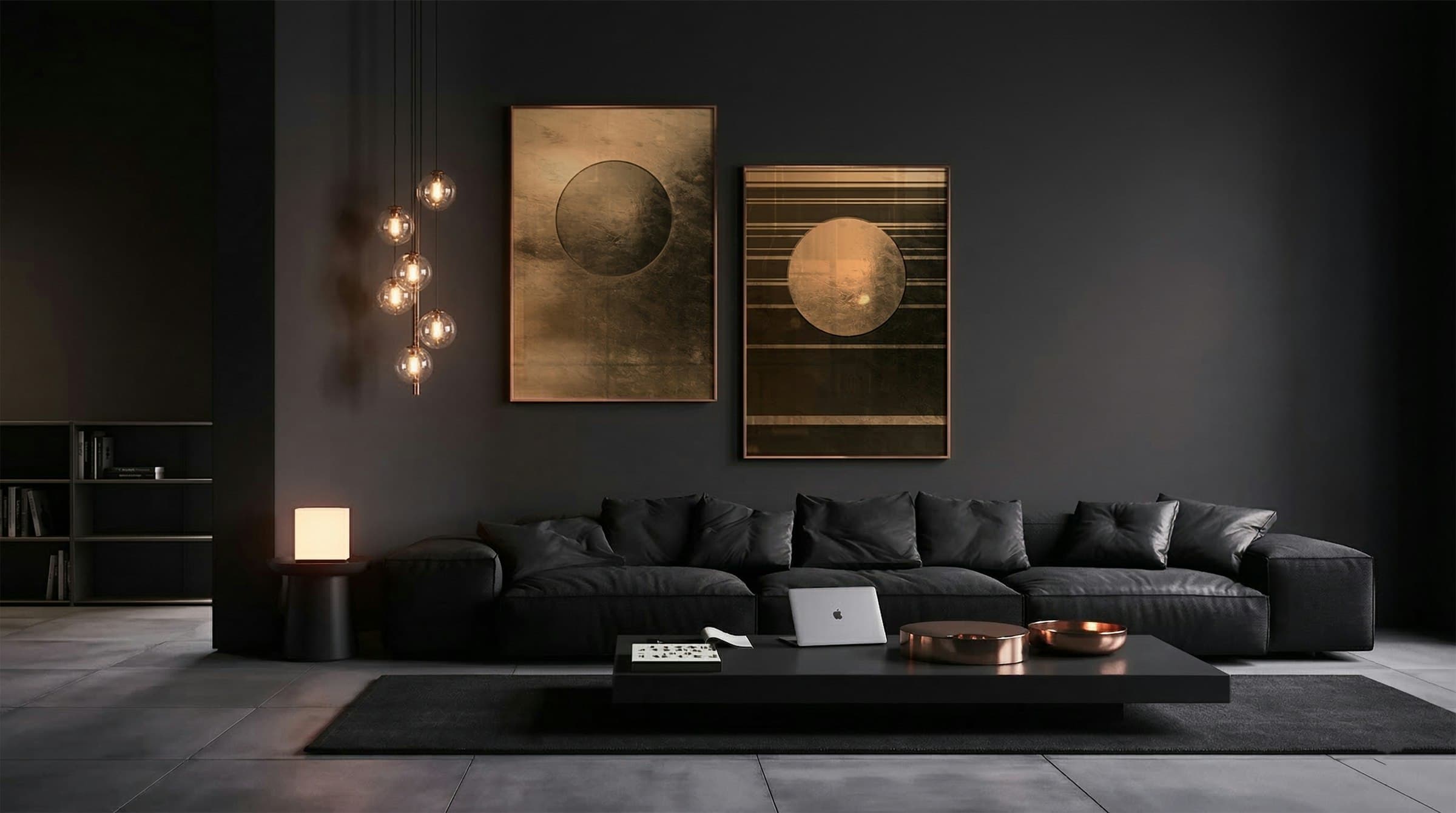 Dark living room with a low leather sofa, bronze artworks and glowing pendant lights